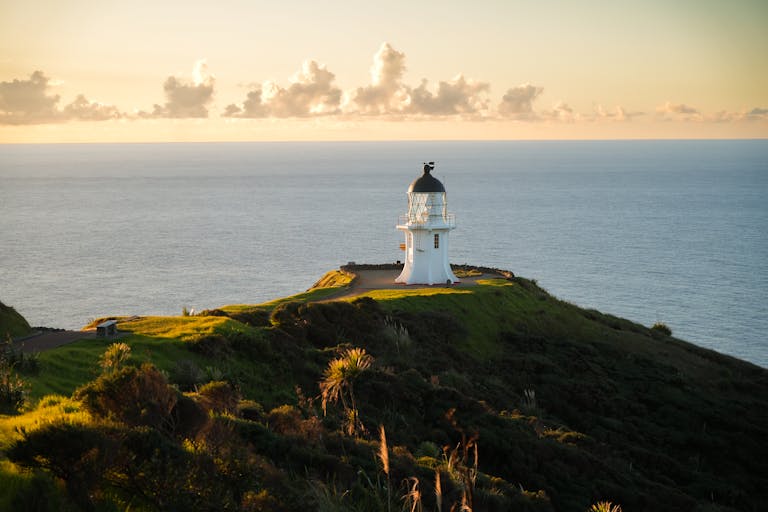 Cape Reinga Lighthouse at Sunset, North Island, Northland New Zealand