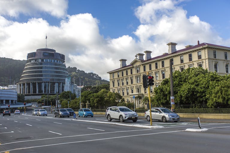 View of the Beehive and adjacent historic building in Wellington, New Zealand.